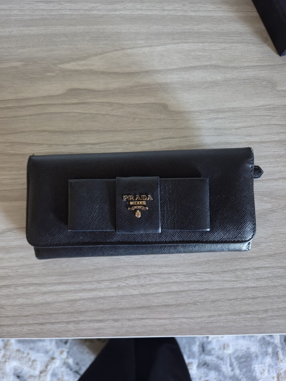 Prada Black Wallet with Gold Logo Bow Detail